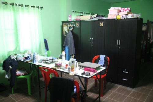 Girls’s bedroom – study area and closets.
