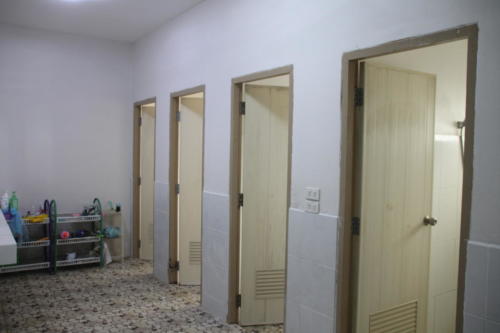 Girl’s bathroom – toilets and showers.