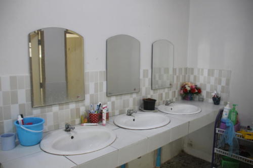 Girl’s bathroom – sinks and mirrors.