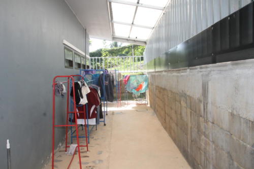 Drying area for girl’s clothing.